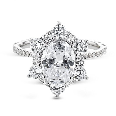 Oval Shaped Diamond Halo Engagement Ring in White Gold