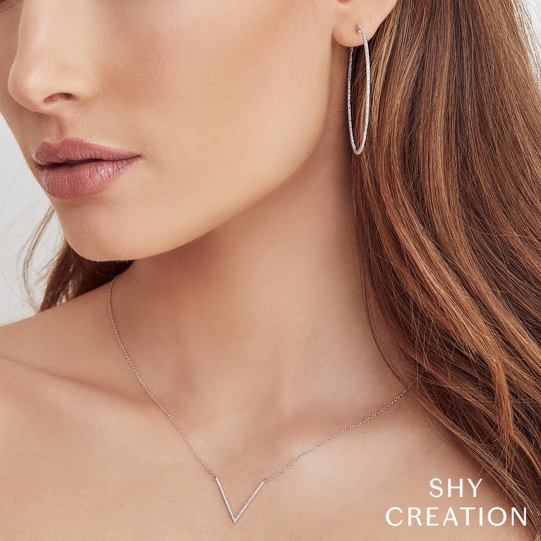 0.66CT DIAMOND HOOP EARRING