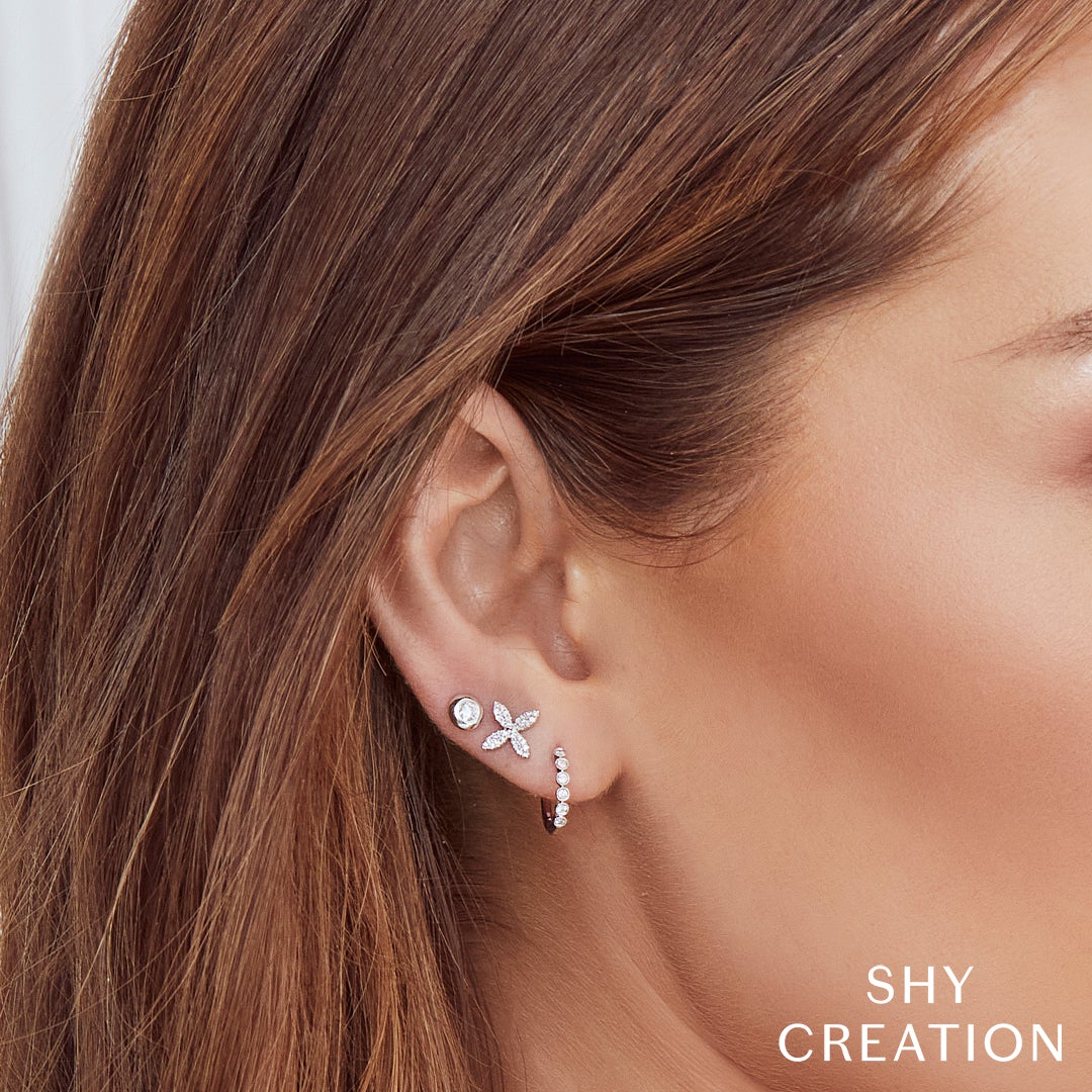 0.16CT DIAMOND FLOWER STUD EARRING